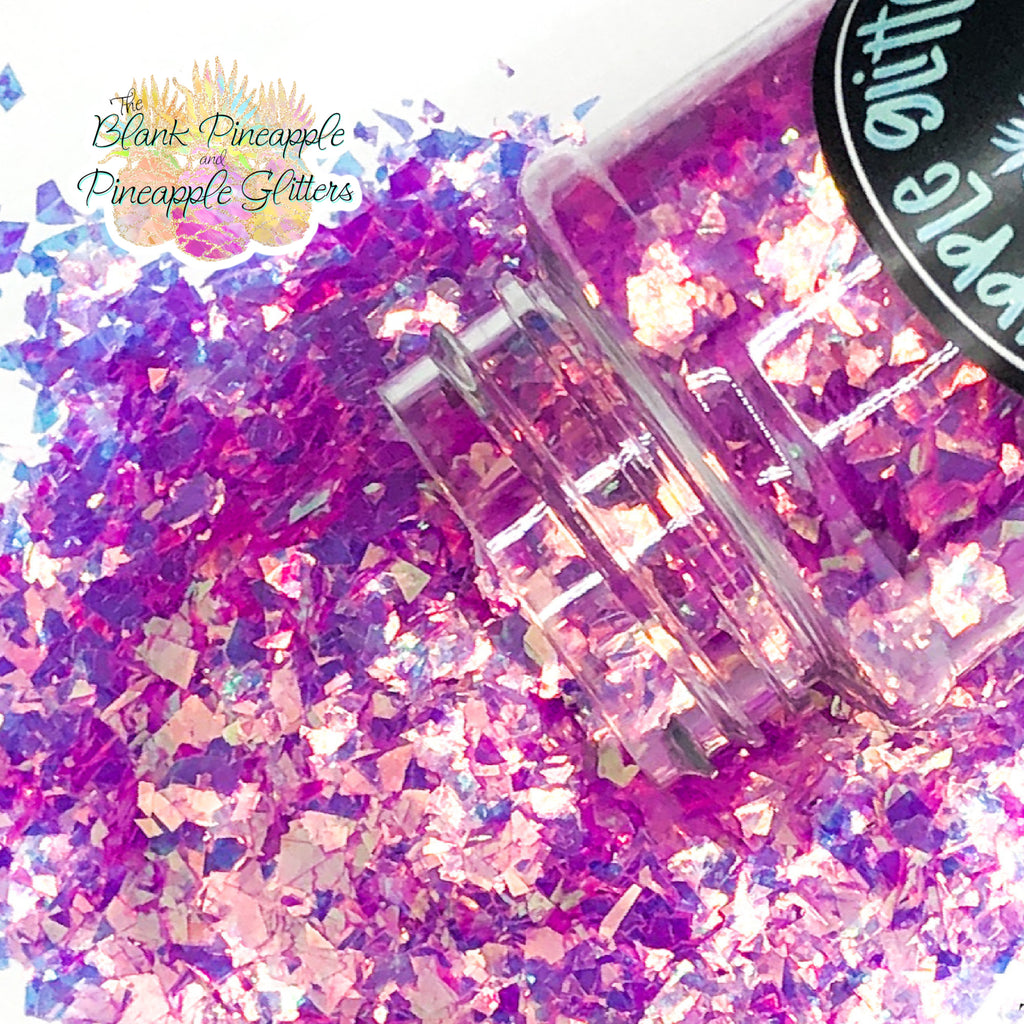 Pink Irregluar Cut Iridescent Glitter. Perfect for adding a smooth, shimmering finish to crafts, nails, or resin projects. Pineapple Glitters, The Blank Pineapple. 