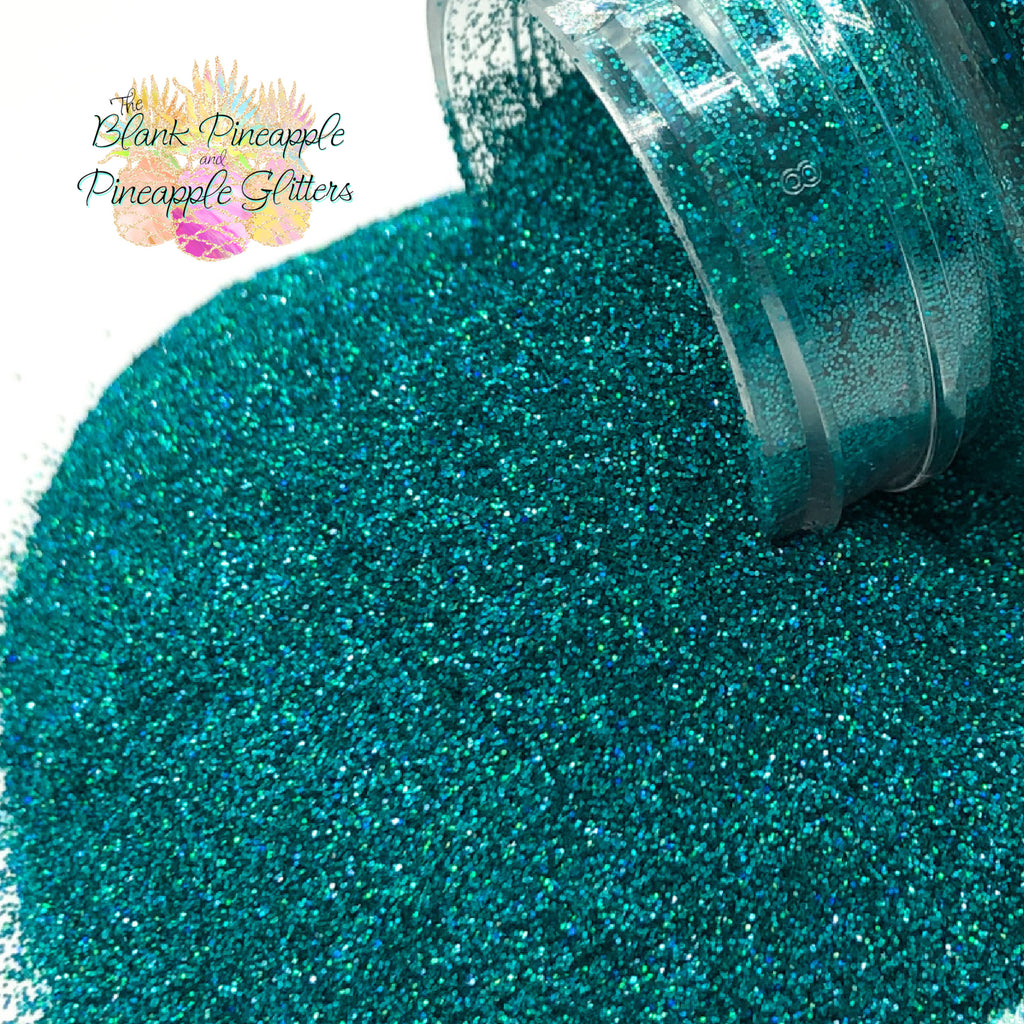 Green Holographic Glitter in Ultra Fine cut. Perfect for adding a smooth, shimmering finish to crafts, nails, or resin projects. Pineapple Glitters, The Blank Pineapple. 