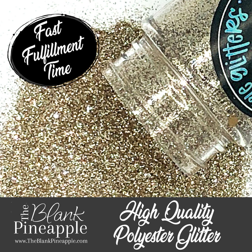 Golden Egg ultra fine cut metallic gold glitter, PET polyester, 2oz shaker bottle for resin projects, tumblers, and nail art. The Blank Pineapple.