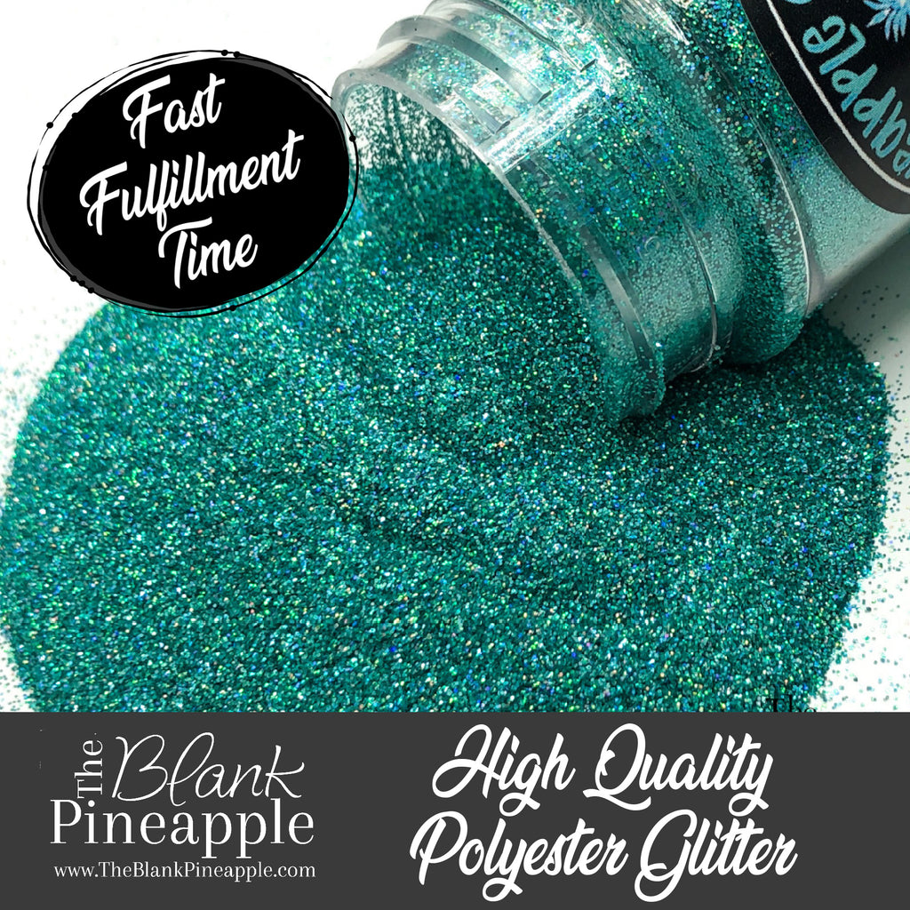 Jade green ultra fine cut holographic glitter, PET polyester, 2oz shaker bottle for crafts, resin projects, and nails. The Blank Pineapple