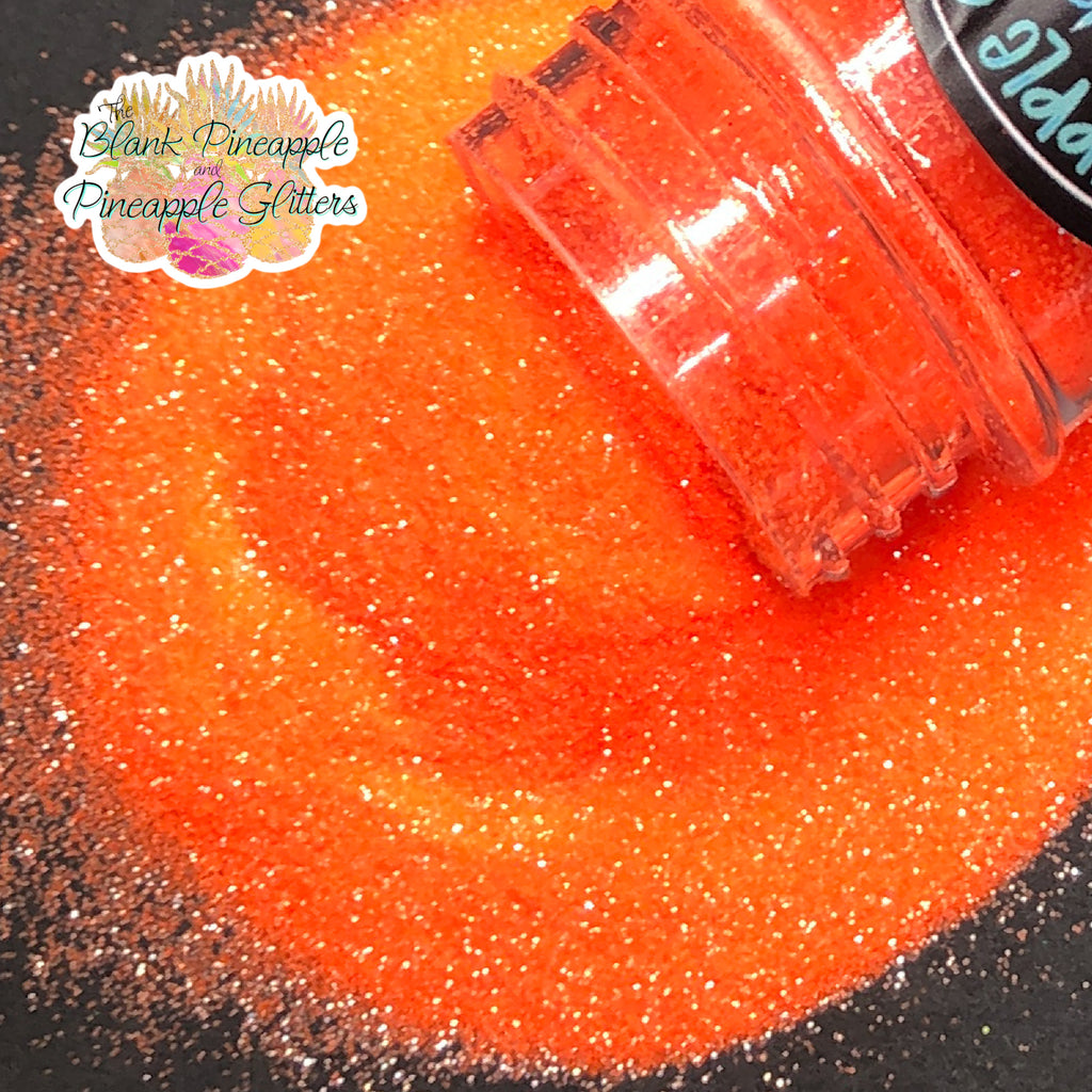 Neon Orange fluorescent ultra fine cut glitter, PET polyester, 2oz shaker bottle for resin projects, tumblers, and UV-reactive crafts. The Blank Pineapple