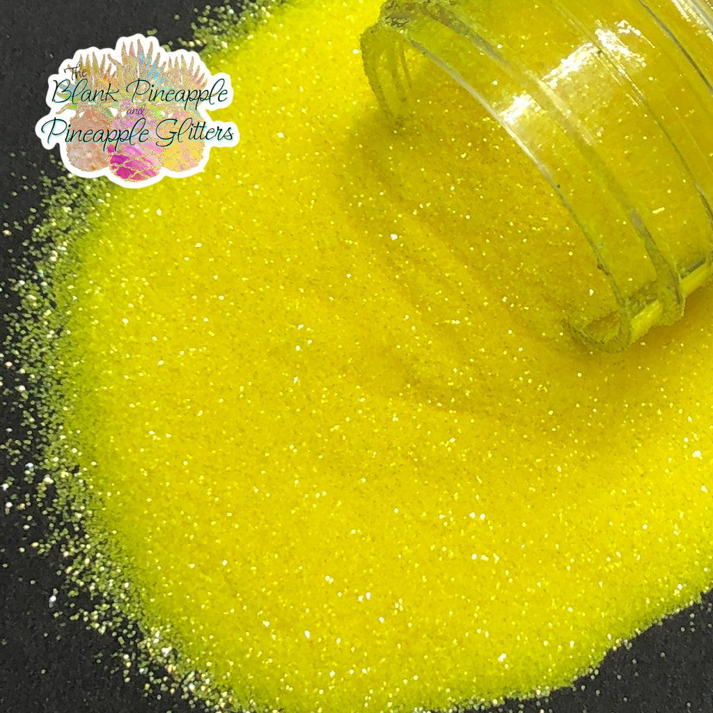 Neon Yellow fluorescent ultra fine cut glitter, PET polyester, 2oz shaker bottle for resin projects, tumblers, and UV-reactive crafts. The Blank Pineapple