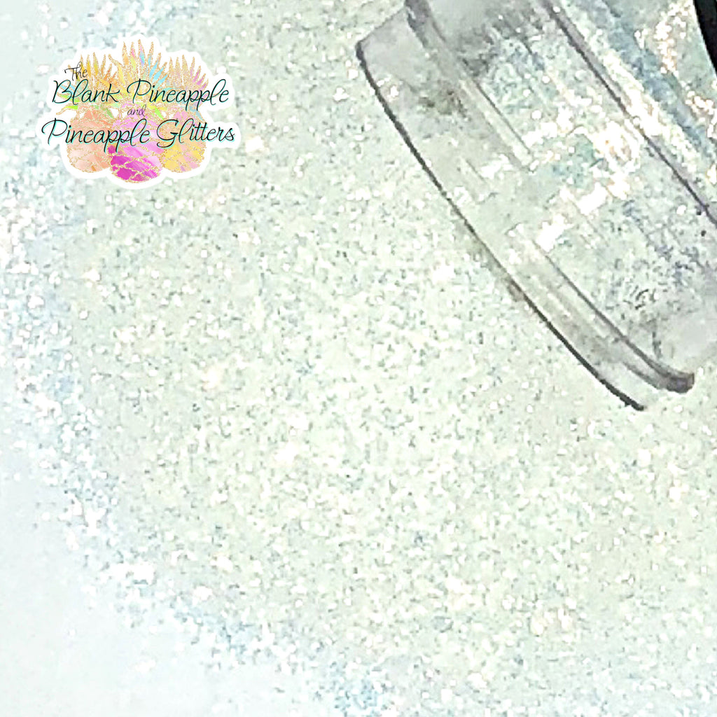 Ocean Ice high sparkling opal iridescent glitter, opal white with blue undertones, 2oz shaker bottle for resin art, tumblers, and nail designs. The Blank Pineapple