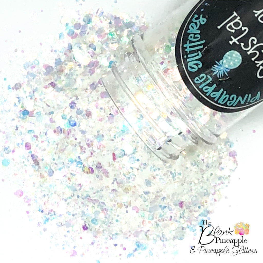 Crystal Clear iridescent mixed glitter in a 2oz shaker bottle, perfect for crafts, resin projects, and nail art. The Blank Pineapple